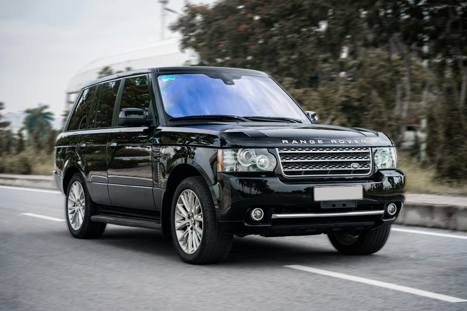 Black Range Rover on tarmac at the dispatch base
